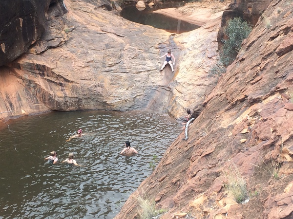 family in swimming hole
