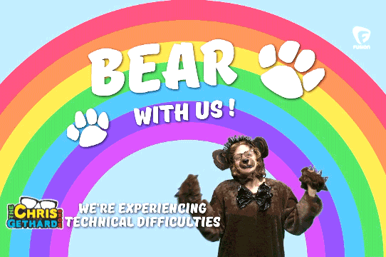 A person in a bear costume twirls in front of a rainbow with the caption that reads Bear With Us