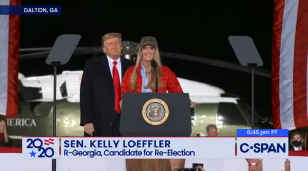 Kelly Leoffler on stage at a Trump rally