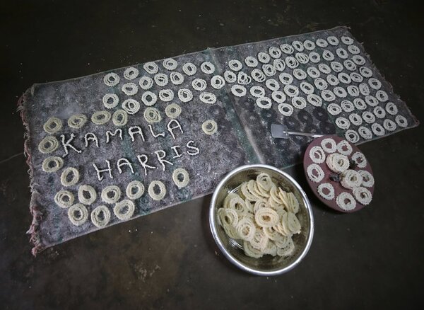 Kamala Harris' name spelled out using savory Murukku surrounded by tens of other circles.