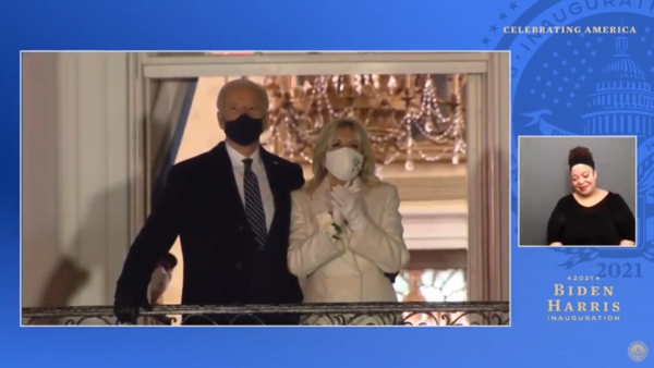Joe Biden and Jill Biden watch fireworks from the White House balcony, in a screenshot from a YouTube video of the Celebrating America special