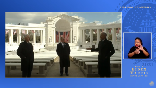Bill Clinton, George W Bush and Barack Obama stand a few feet apart from each other in a courtyard, in a screenshot from a YouTube video of the Celebrating America special