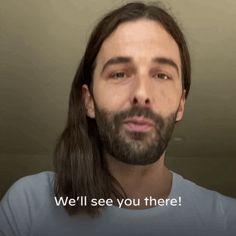 Jonathan Van Ness appears with his dark shoulder-length hair out but tucked behind his ears as he brings his hands up to kiss them and says we'll see you there.