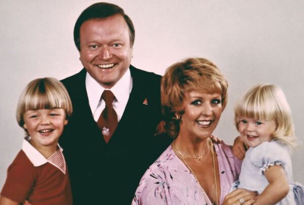 Bert, Patti, Matthew and Lauren pose in a colourful family portrait.