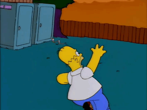 A GIF of Homer Simpson running through a wooden fence into the sunset