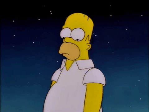 A GIF of Homer Simpson holding his hand to his chin in deep thought, with a starry night in the background. 