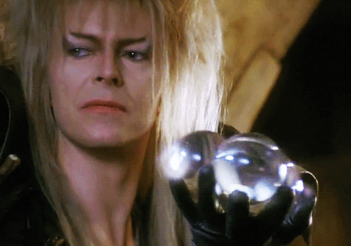 A gif of David Bowie in Labyrinth juggling crystal balls.